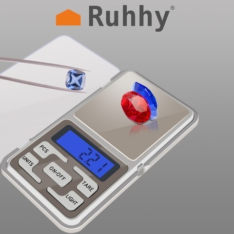 Waga precyzyjna, jubilerska gramowa z klapką z logo producenta i diamentem